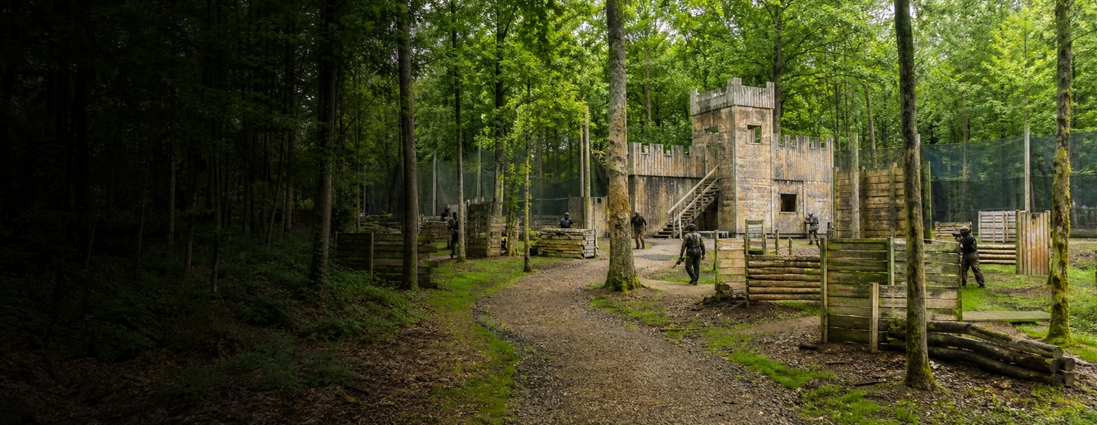 A professionally organised woodland paintball venue with timber game zones
